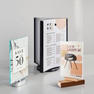 Rotating sign holder