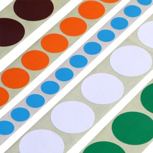Coloured adhesive discs made of paper 